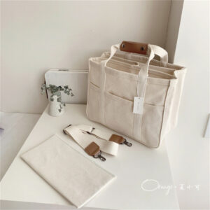 2024 Korean ins wind mummy bag fashion multi-functional mother and baby go out shoulder slung portable canvas mother bag