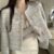 Pearl buckle Chanel style coat for women 2023 Spring and Autumn New French design sense niche loose short temperament top